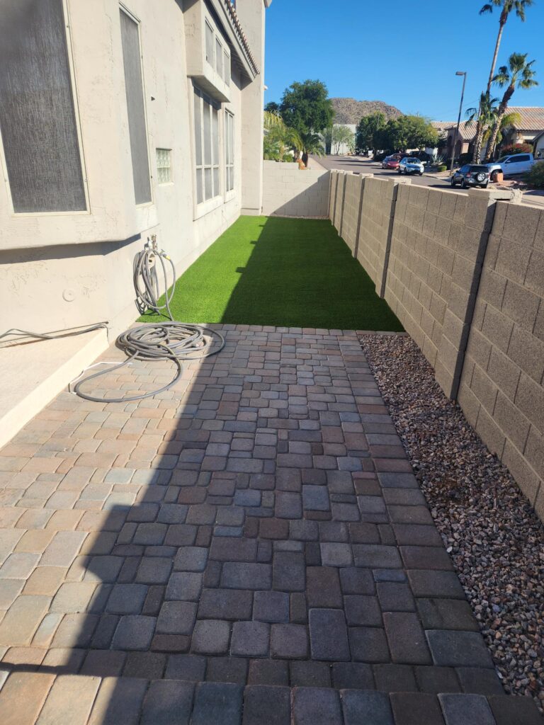 Paver walkway and turf installation along side yard
