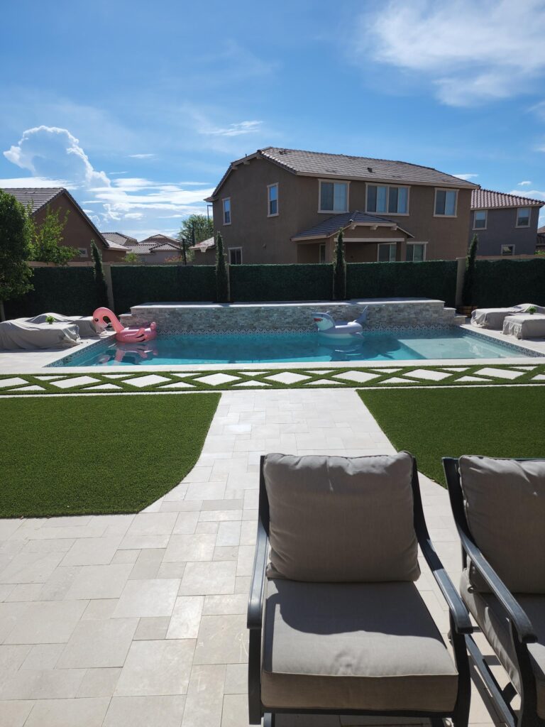 Completed backyard pool and patio design