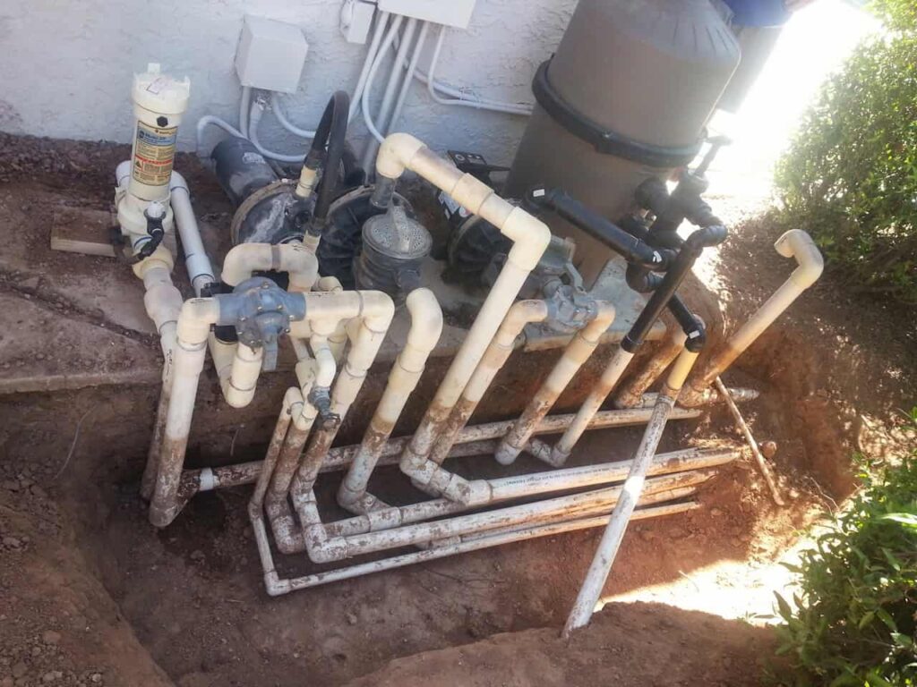 Pool plumbing repair with underground pipe replacement
