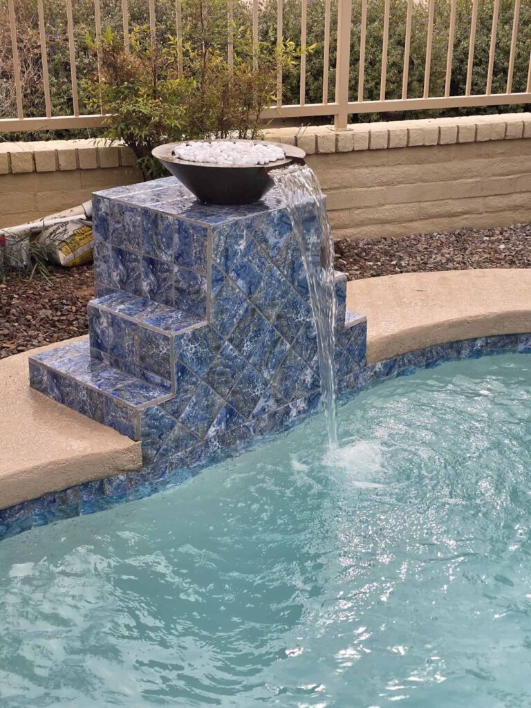 pool water feature with tile spillway