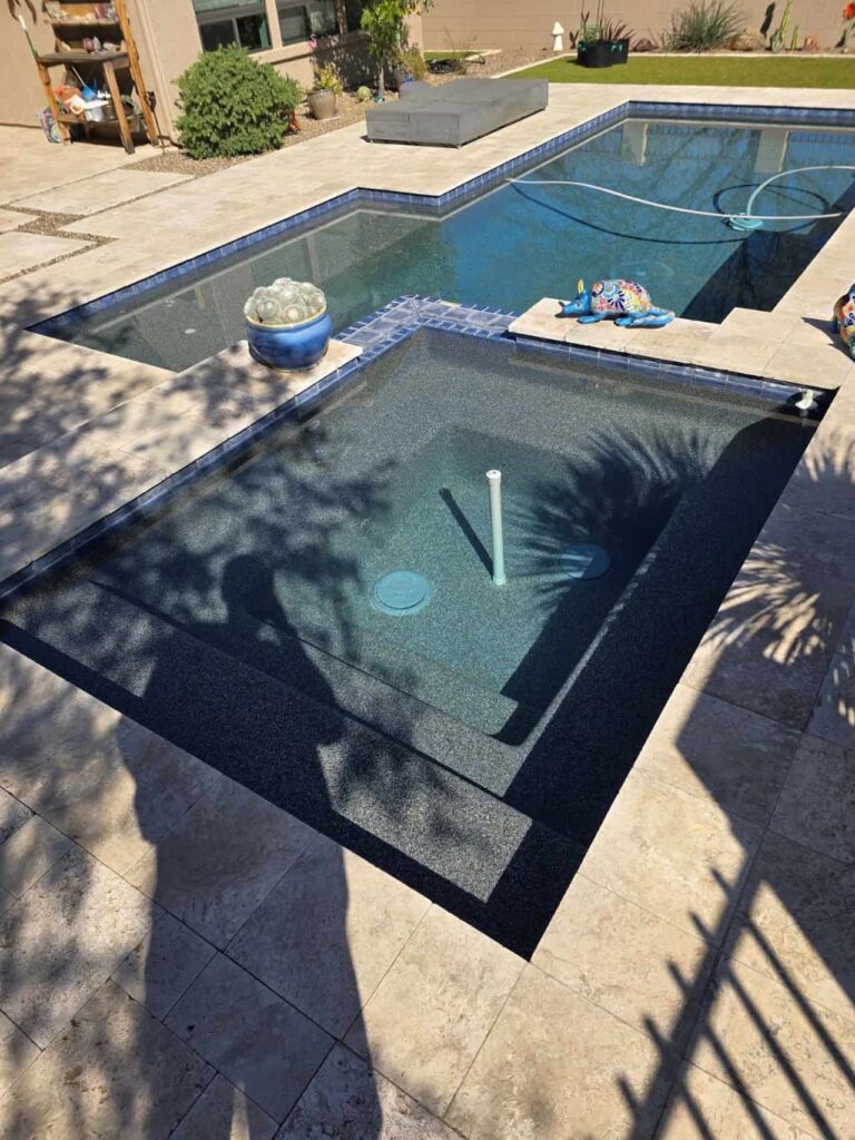 rectangular backyard pool with clean water and routine care